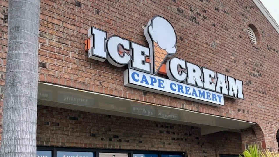 Cape Creamery storefront, brick building with Ice Cream sign