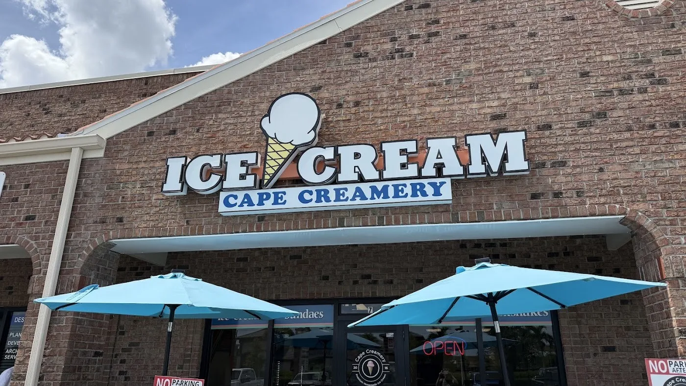 Cape Creamery storefront with turquoise umbrellas